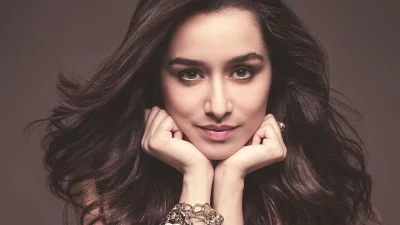 Captivating Woman with Flowing Dark Hair and Elegant Jewelry Portrait image