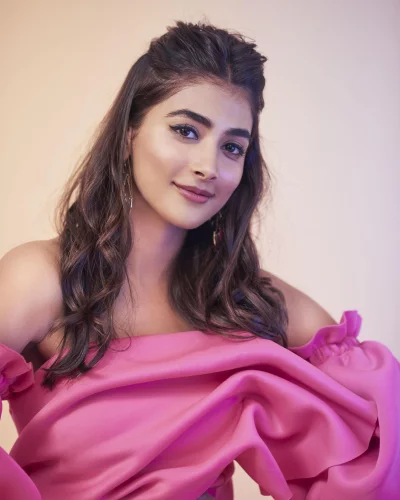 Pooja Hegde Posing in Vibrant Pink Off-Shoulder Ruffle Top image
