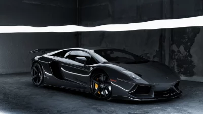 Sleek Dark Grey Lamborghini Aventador Sports Car with Orange Brakes in a Modern Industrial Setting image