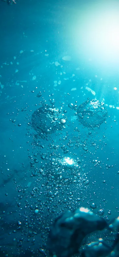 Underwater Scene with Bubbles Rising Towards Sunlight