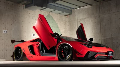 Customized Red Lamborghini Aventador Supercar with Open Scissor Doors in Modern Garage image