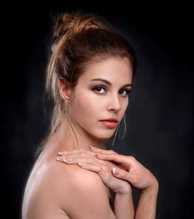 Elegant Portrait of Young Woman with Natural Beauty and Manicured Hands image
