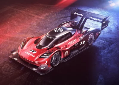 High-Performance Volkswagen ID.R Electric Race Car on Track with Dynamic Lighting image