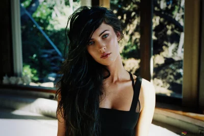 Captivating Megan Fox Portrait with Long Dark Wavy Hair and Expressive Eyes image