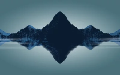 Digital mountain peaks reflected in tranquil waters creating an otherworldly symmetrical landscape image