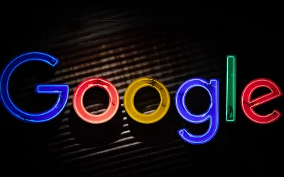 Vibrant Google Logo in Neon Lights Glowing on a Dark Textured Background image