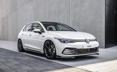 White Volkswagen Golf 8 Hatchback Modern Design on Urban Pavement image