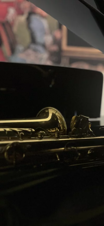 Close-up of a Gleaming Golden Saxophone with Intricate Details and Keys image