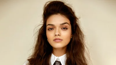 Captivating Portrait of a Young Woman with Dark Hair and Expressive Brown Eyes image