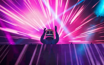Marshmello DJ Performing Live at Vibrant Music Festival Stage with Bright Lights Wallpaper image