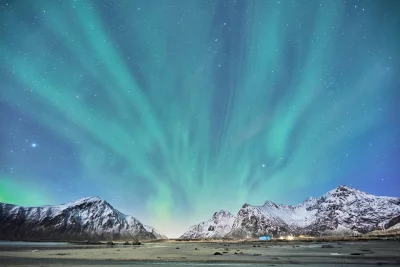 Breathtaking Aurora Borealis Dancing Over Snow Capped Mountains Cinematic Landscape Wallpaper image