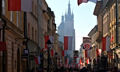 Krakow Old Town Independence Day Celebration with Polish Flags image