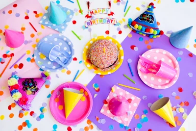 Joyful Flat Lay of Colorful Birthday Party Elements and Cake image