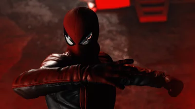 Mysterious Spider-Man Figure in Red and Black Suit with Glowing Eyes image