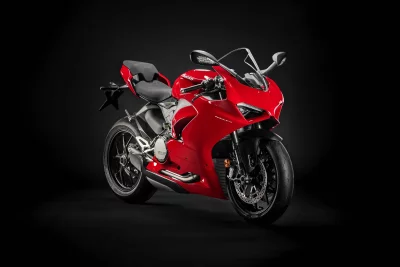 Sleek Red Ducati Panigale V2 Sportbike: High-Performance Motorcycle on Black Background image
