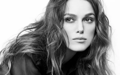 Intense Black and White Portrait of a Woman with Piercing Gaze image