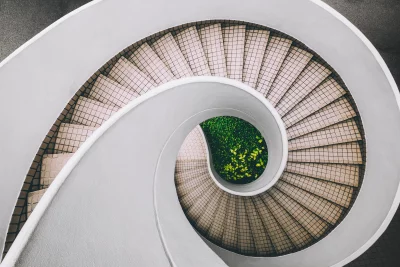 Architectural Spiral Staircase with Greenery, Modern Design View image