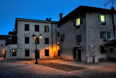 Evening Scene in Historic European Town with Warm Lights image