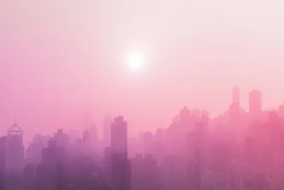 Vibrant Gradient Urban Skyline with Misty Haze at Dawn or Dusk image
