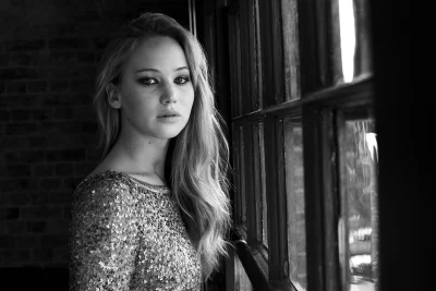 Captivating Black and White Portrait of a Pensive Woman in Shimmering Sequined Gown image