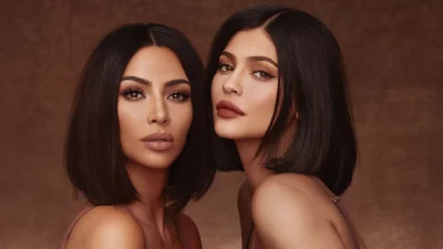 Beauty Moguls Kim Kardashian and Kylie Jenner in Striking Studio Portrait image