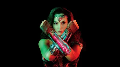 Wonder Woman Performing Bracelets Crossed Deflection Pose image