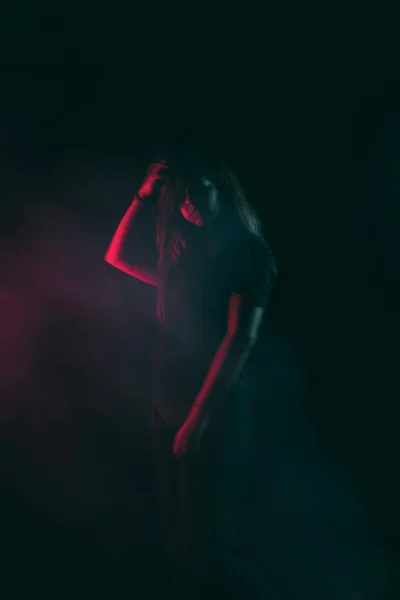 Dramatic Portrait with Red and Blue Lighting