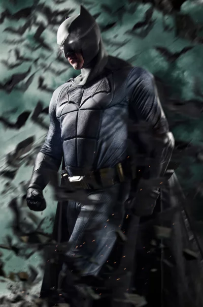 Dynamic Batman Superhero Emerging from Shadows with Swirling Bats and Intense Gaze image