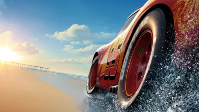 Dynamic Red Race Car Splashing Water on Sandy Beach at Sunset image