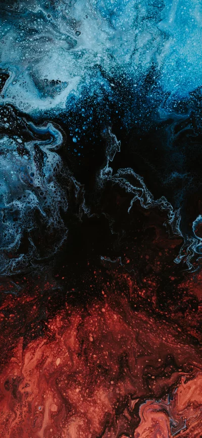 Abstract fluid art with vibrant blue and fiery red hues on dark background image