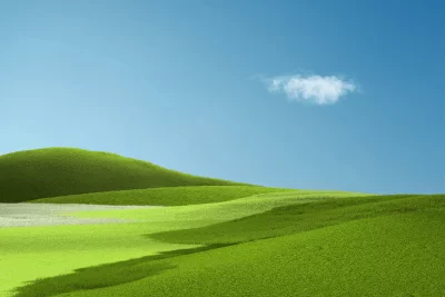 Serene Rolling Green Hills Landscape Under Clear Blue Sky with Distant Cloud image