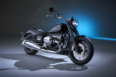 Sleek Black BMW R 18 Cruiser Motorcycle in Studio Setting with Glowing Headlight image
