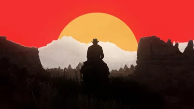 Silhouette of lone rider on horseback against vibrant western sunset image