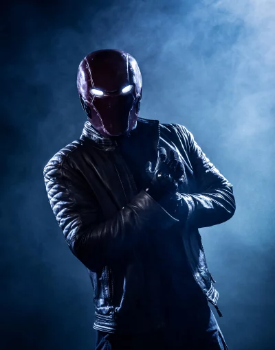 Vigilante in Glowing Red Helmet and Leather Jacket in Smoky Atmosphere image
