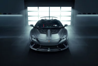 Sleek Grey Lamborghini Sports Car Front View Modern Studio Cinematic Wallpaper image