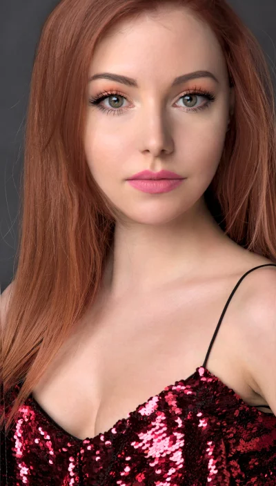 Stunning Redhead Woman with Green Eyes in Sparkling Sequined Dress image