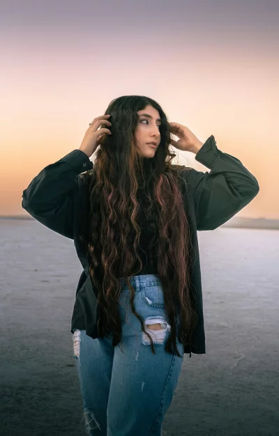 Contemplative Young Woman Desert Landscape Sunset