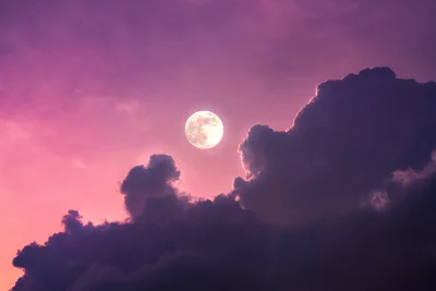 Mystical Full Moon Illuminates Dramatic Pink and Purple Twilight Sky image