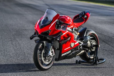 Red Ducati Panigale V4 Superleggera High-Performance Sportbike on Racetrack image