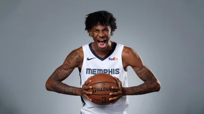 Dynamic Basketball Player Unleashing a Powerful Roar with Ball in Studio image