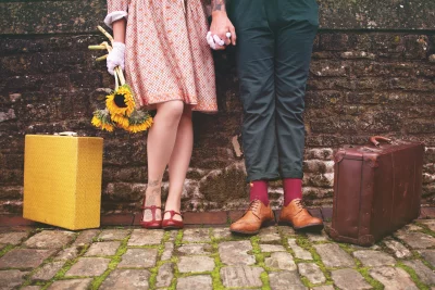 Romantic Vintage Journey Couple with Sunflowers and Old Suitcases image