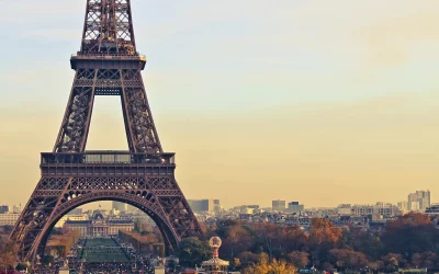 Majestic Eiffel Tower Bathed in Golden Autumn Sunset Over Paris Cityscape image