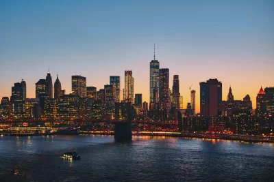 New York City Manhattan Skyline at Dusk with Illuminated Brooklyn Bridge image