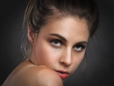 Intense Portrait of a Young Woman with Direct Gaze and Expressive Eyes image