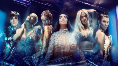 Kardashian-Jenner Sisters in Dazzling Sequins Against a Futuristic Blue Backdrop image