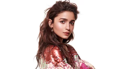 Captivating Young Woman in Sequined Fashion with Wavy Hair on White Background image