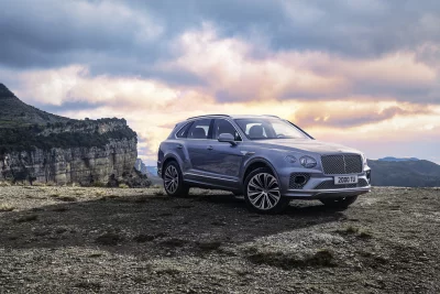 Luxury Bentley Bentayga SUV Dominates Rugged Mountain Vista at Sunset image