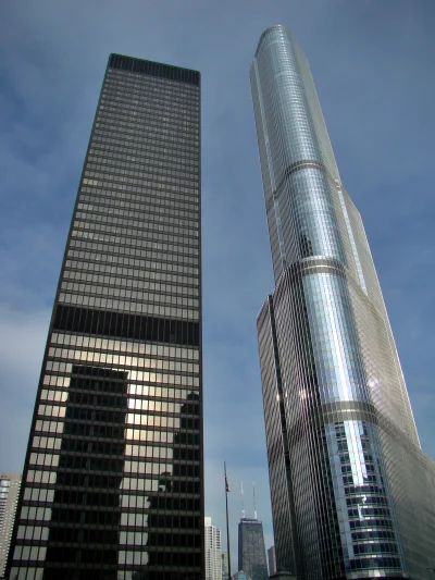 Soaring Modern Skyscrapers and Historic Architecture in a Vibrant Urban Cityscape image