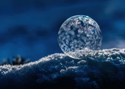 Macro Shot of a Frozen Soap Bubble with Intricate Ice Crystal Patterns in Winter image