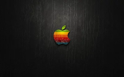 Retro Striped Apple Emblem with Distressed Texture on Black Leather Background image